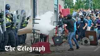 Antiimmigration protesters smash through migrant hotel in Rotherham [upl. by Sievert]