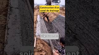 Construction dun canal de drainage gutt shorts pipeline canalisation plumbing concrete wow [upl. by Eirual]