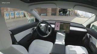 Tesla car drives itself through parking lots with ‘Smart Summon’ feature [upl. by Kitrak]