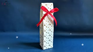 How to wrap a bottle as gift with wrapping paper  Gift wrapping ideas for wine bottle [upl. by Marianne]