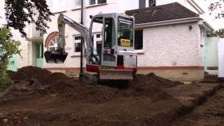 Takeuchi TB016 Grading A Driveway [upl. by Sivat]