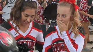 Football players kind gesture to cheerleader goes viral [upl. by Kcyred]