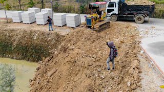 Excellent work KOMATSU DOZERS D20P push soil fill the pond amp Truck unloading [upl. by Slemmer145]