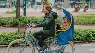 Bubup Kids Rain protection for child bike seat Rain cover for rear child bike seats [upl. by Nilauqcaj]