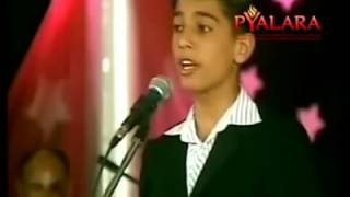 ‫محمد عساف في برنامج نجم فلسطين عندما كان عمره 15 سنة‬ [upl. by Pedrotti249]