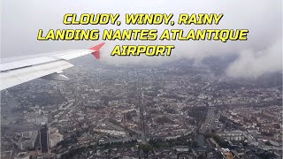 CLOUDYWINDYRAINY LANDING  NANTES ATLANTIQUE AIRPORT  VOLOTEA A319111 ECMUC  DOWNTOWN VIEW [upl. by Idnic]