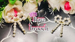 how to make pearls beads bow brooch🎀pearls beads craft ideashandmade jewelleryeasy jwellery cf [upl. by Sink]