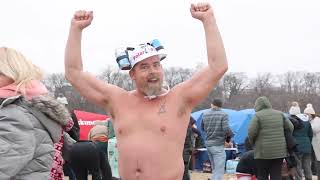 Watch these brave souls make the jump into Lake Michigan for 2024 Polar Bear Plunge [upl. by Omar]