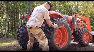 Installing Trygg Ice and Forestry Chains on the Tractor [upl. by Paten]