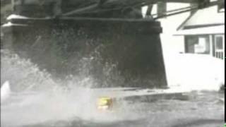 Snowmobile Hits bridge while watercrossing [upl. by Nailliw486]