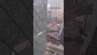 Sudden storm leaves window washers dangling from skyscraper in China  shorts windowwashing [upl. by Rudman]