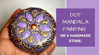 Dot mandala painting on a hand casted stone Dot mandala rock painting handmade [upl. by Dafodil]