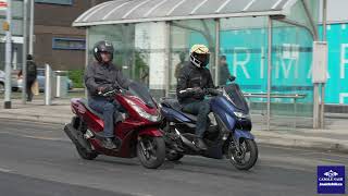 2021 Honda PCX 125 v Yamaha NMAX 125 Scooter comparison test [upl. by Frisse]