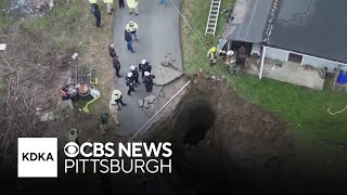 Pennsylvania woman believed to have fallen into sinkhole while searching for cat [upl. by Gerbold35]