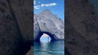 Through a cave SUP foiling through a Greek cave foiling [upl. by Lyrradal]