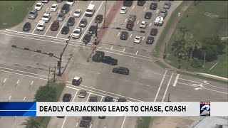 Deadly carjacking leads to chase crash [upl. by Bertolde364]