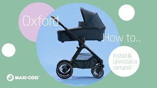 How to attach a Carrycot on the MaxiCosi Oxford stroller [upl. by Nhguavahs36]