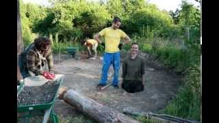 Building a roundhouse with natural material [upl. by Llehsyar]