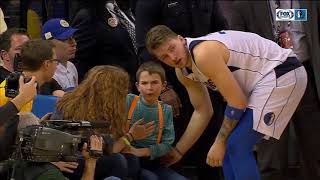 Luka Doncic autographs jersey for young fan after collision in game at Golden State [upl. by Atnauq842]