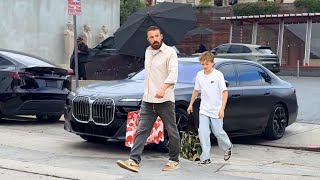 Ben Affleck today looks relaxed as he enjoys a shopping holiday with his son Samuel in Los Angeles [upl. by Mastat]