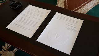 President Higgins signs Presidential Pardons for Mr Sylvester Poff and Mr James Barrett [upl. by Okimik]