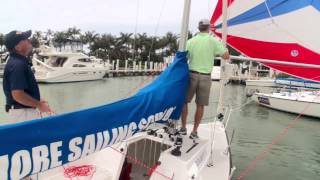 Offshore Sailing School  How to Jibe a Symmetric Spinnaker [upl. by Einoj18]