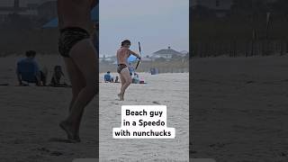 Myrtle Beach dude in a Speedo with nunchucks beach nunchucks speedo martialarts [upl. by Ariahs]