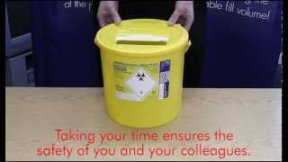 OLD VIDEO  How to put a lid on a large Daniels SHARPSGUARD® container [upl. by Sivi]