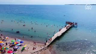 Warm water of Kyrgyzstans IssykKul lake captivates tourists [upl. by An762]