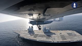 Drone makes history landing on Royal Navy aircraft carrier at sea [upl. by Lessig]