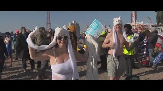 New Yorkers brave the icy water for annual polar bear plunge [upl. by Carmita]