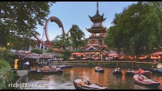 Copenhagen Denmark Tivoli Gardens  Rick Steves’ Europe Travel Guide  Travel Bite [upl. by Ahsikin198]