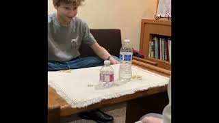 3 bottle flips and the tablecloth trick at the same time [upl. by Wes146]