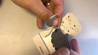 How to cleanchange wax filter on Oticon More miniRITE hearing aid [upl. by Ahseer890]