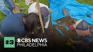 Volunteers kick off Earth Day early by planting trees in Southwest Philadelphia [upl. by Akirdna]