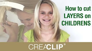 How to cut LAYERS on CHILDRENS hair tutorial Layered hairstyle [upl. by Ardnnaed768]