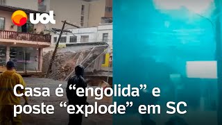 Casa é engolida e poste explode em SC estado tem alerta para chuvas [upl. by Eniluqaj]