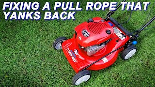 Fixing A TroyBilt Mower That Pulls Back On The Rope [upl. by Aihsar991]