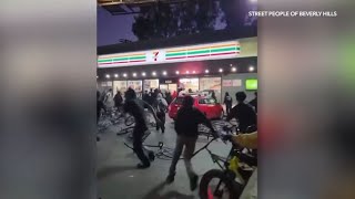 Video captures 50 juveniles ransacking 7Eleven in Los Angeles [upl. by Noloc]