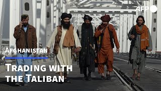 Uzbek traders learn to do business with the Taliban  AFP [upl. by Suirauqed836]