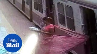 Horrifying moment women dragged after saree got stuck in train [upl. by Adia]