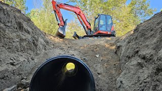 Pond dam pipe replacement with the Kubota KX080 4 [upl. by Adhern179]