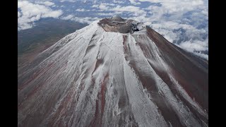 Japans Mt Fuji gets seasons 1st snowcap [upl. by Hopper]