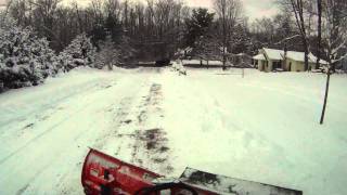 Kubota RTV1100 Plowing Snow w V4291 Plow [upl. by Grekin]