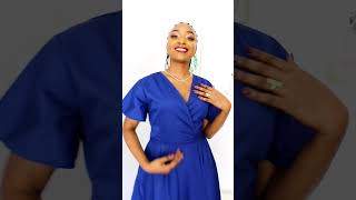 Wrap yourself in elegance with our blue wrap dress BlueWrapDress ChicStyle KenyanFashion [upl. by Eedolem]