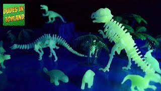 Dinosaur toys GLOW IN THE DARK Halloween toy opening videos for children [upl. by Anaehs]