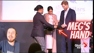 RARE Meg Grabs Harrys Gift AGAIN mid clip meghanmarkel [upl. by Nangem637]