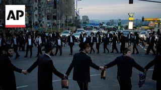 Conflict brews in Israel over military service for UltraOrthodox men [upl. by Einor]