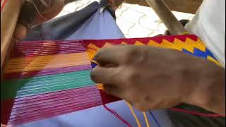 A video of a Kente weaver weaving an Asaase Yaaa cloth the most expensive pattern [upl. by Assyram]