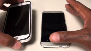 Samsung Galaxy S4 VS HTC One [upl. by Garibold]